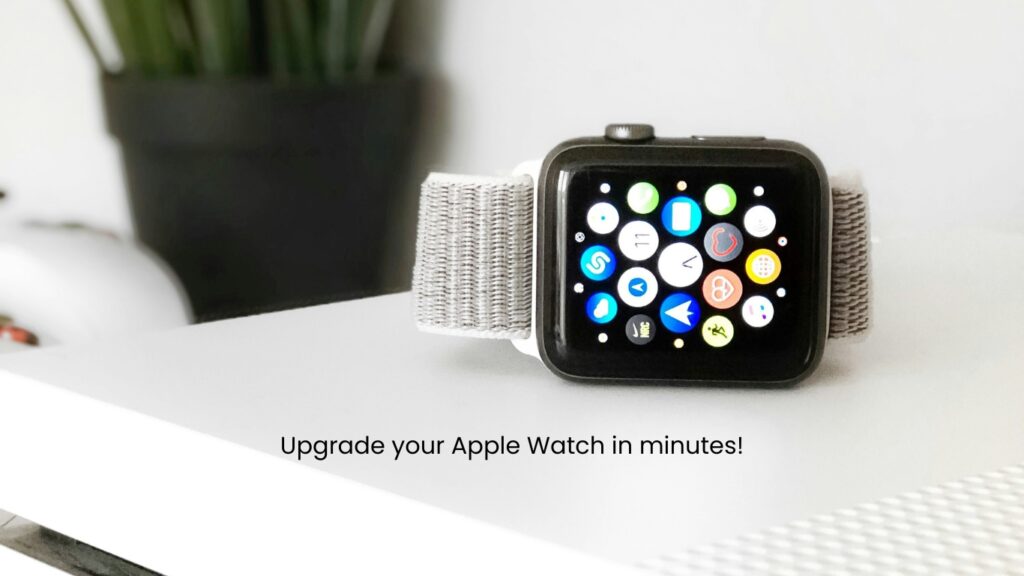 Apple watch placed on white table with a flower pot in background