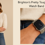 Woman wearing an Apple Watch with Brighton’s Pretty Tough silver band featuring studded details.