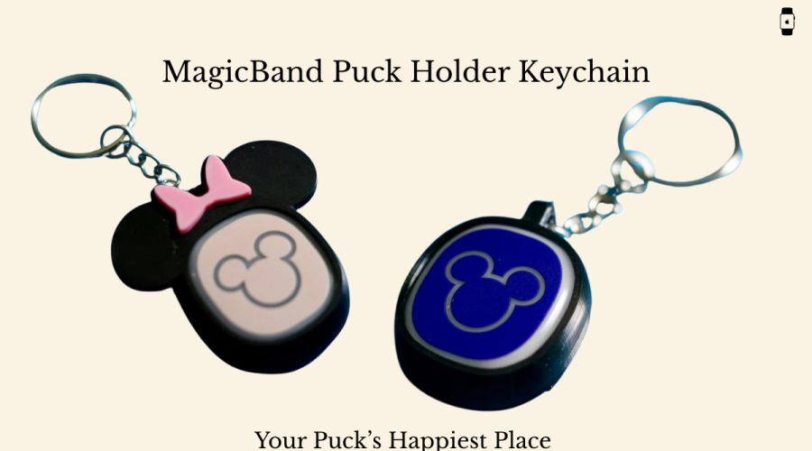 Two star-shaped MagicBand puck holder wands—one pink with a castle icon, and one white with a Mickey Mouse icon—displayed on iridescent fabric backgrounds.